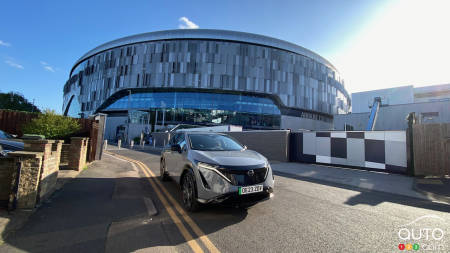 The Ariya in front of the Tottenham stadium